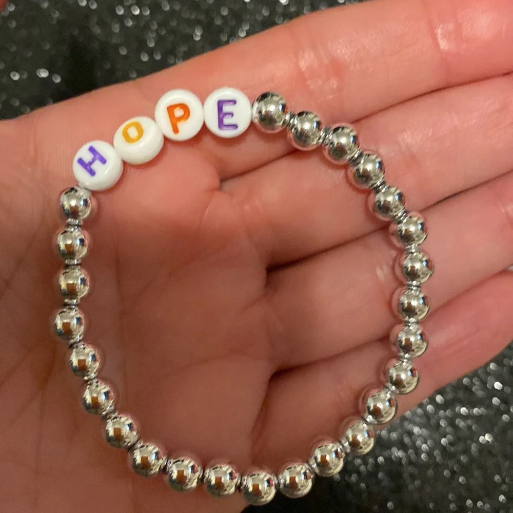 Girls faux silver bead hope stretch bracelet